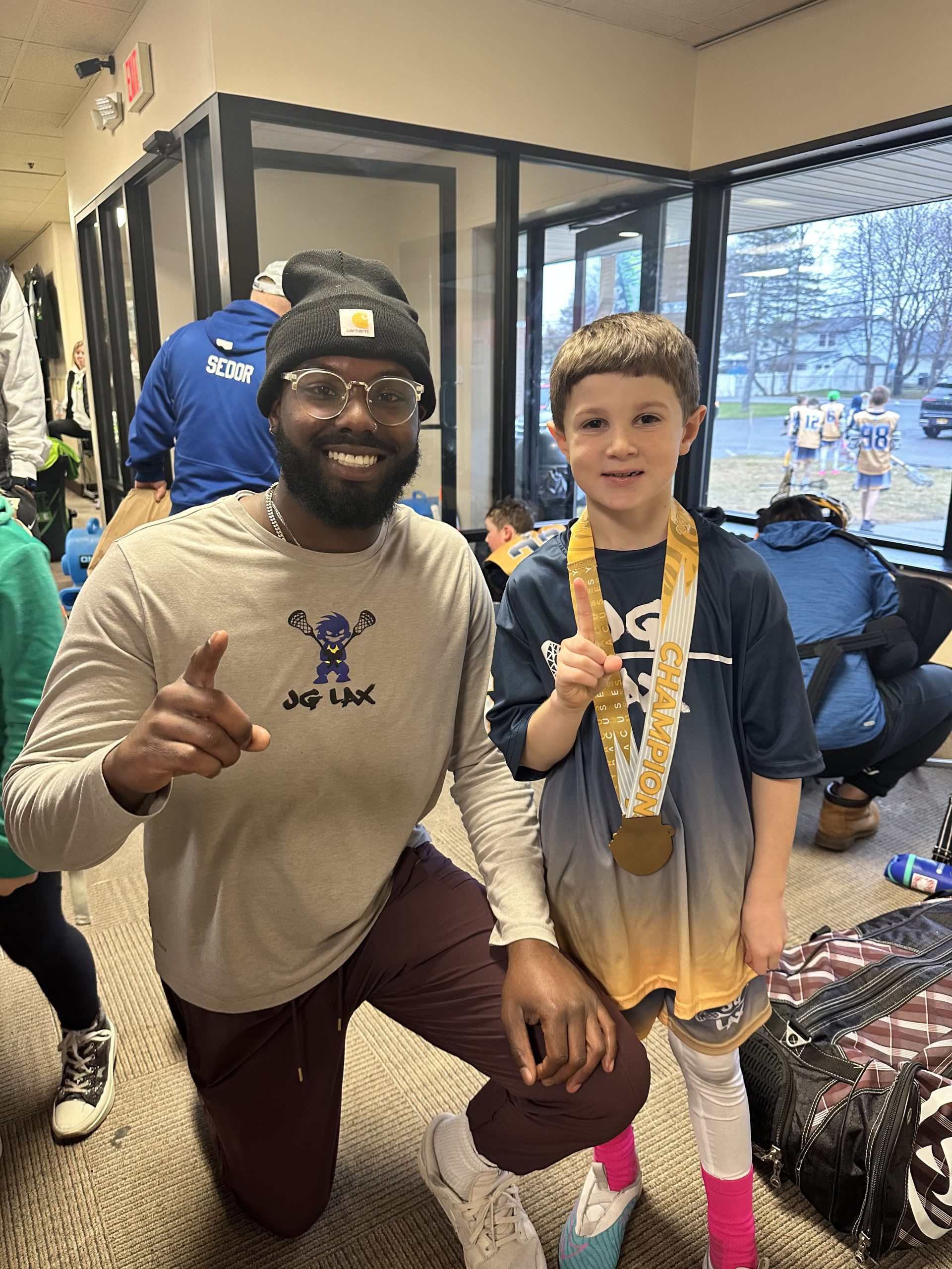 Independent lacrosse trainer working with an athlete